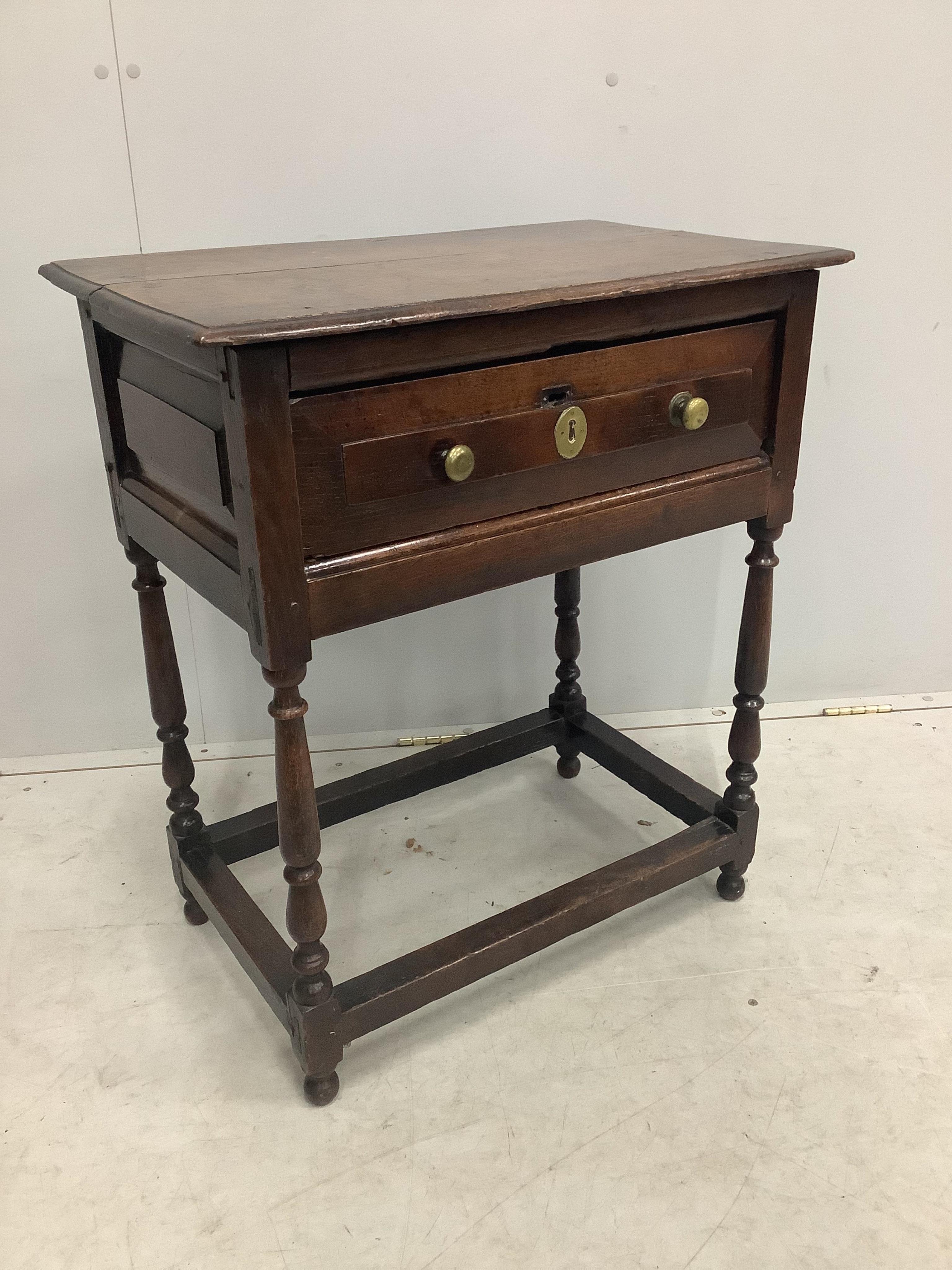 A small 18th century single drawer oak side table, width 65cm, depth 40cm, height 75cm. Condition - fair